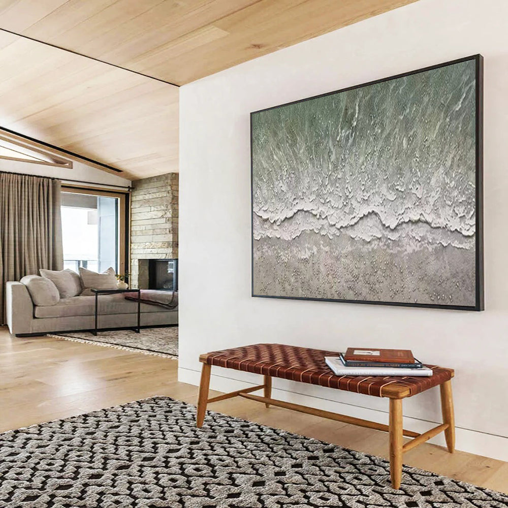 Aerial view of a beach with gentle waves and a textured shore CT1667