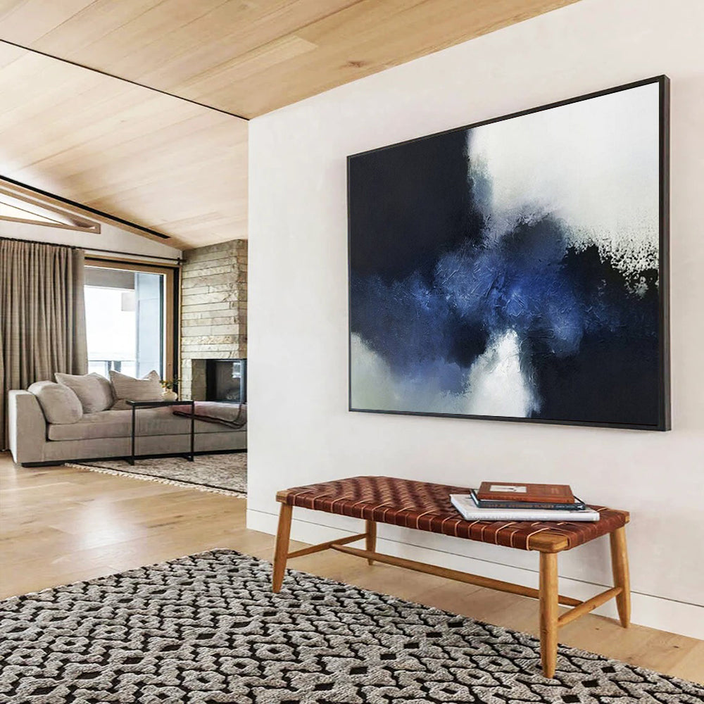 Abstract painting with large blocks of dark blue, light blue, and white CT1661