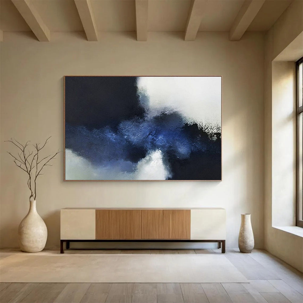 Abstract painting with large blocks of dark blue, light blue, and white CT1661