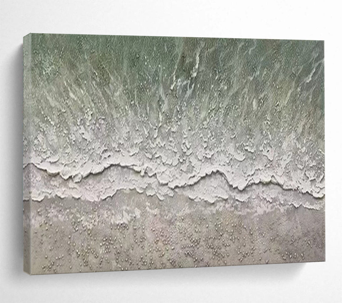 Aerial view of a beach with gentle waves and a textured shore CT1667