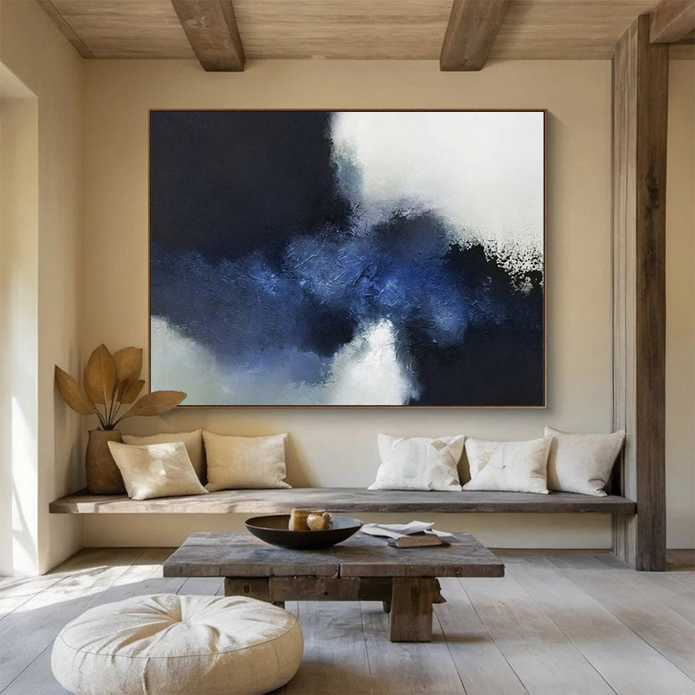 Abstract painting with large blocks of dark blue, light blue, and white CT1661