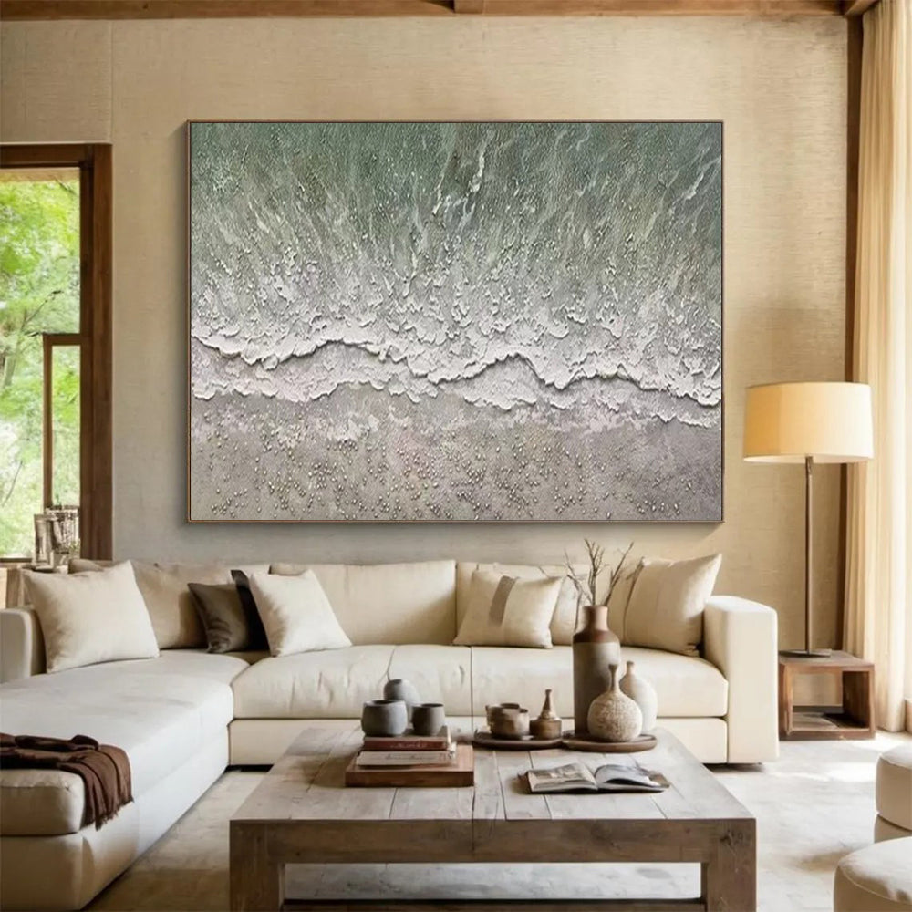 Aerial view of a beach with gentle waves and a textured shore CT1667