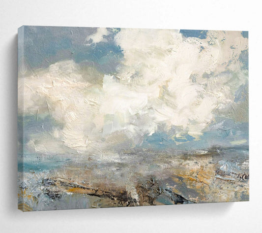 Seascape with fluffy clouds, blue sky, and a textured shoreline CT1665
