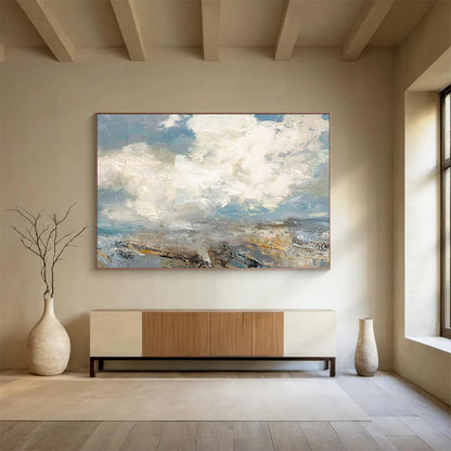Seascape with fluffy clouds, blue sky, and a textured shoreline CT1665