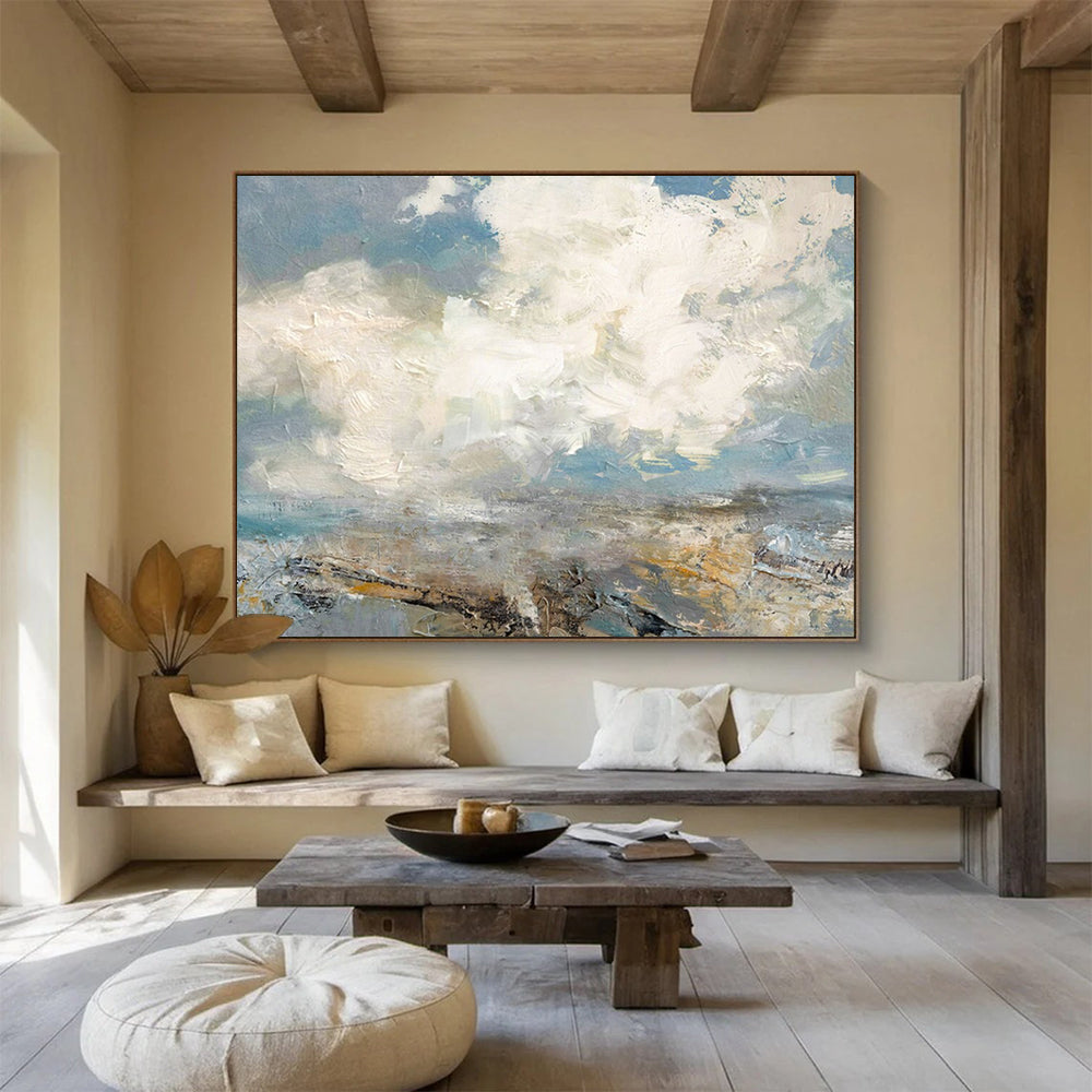 Seascape with fluffy clouds, blue sky, and a textured shoreline CT1665