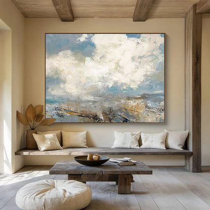 Seascape with fluffy clouds, blue sky, and a textured shoreline CT1665