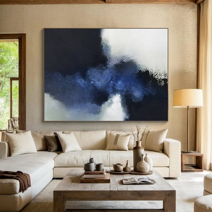 Abstract painting with large blocks of dark blue, light blue, and white CT1661