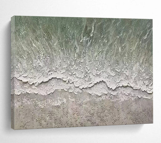Aerial view of a beach with gentle waves and a textured shore CT1667