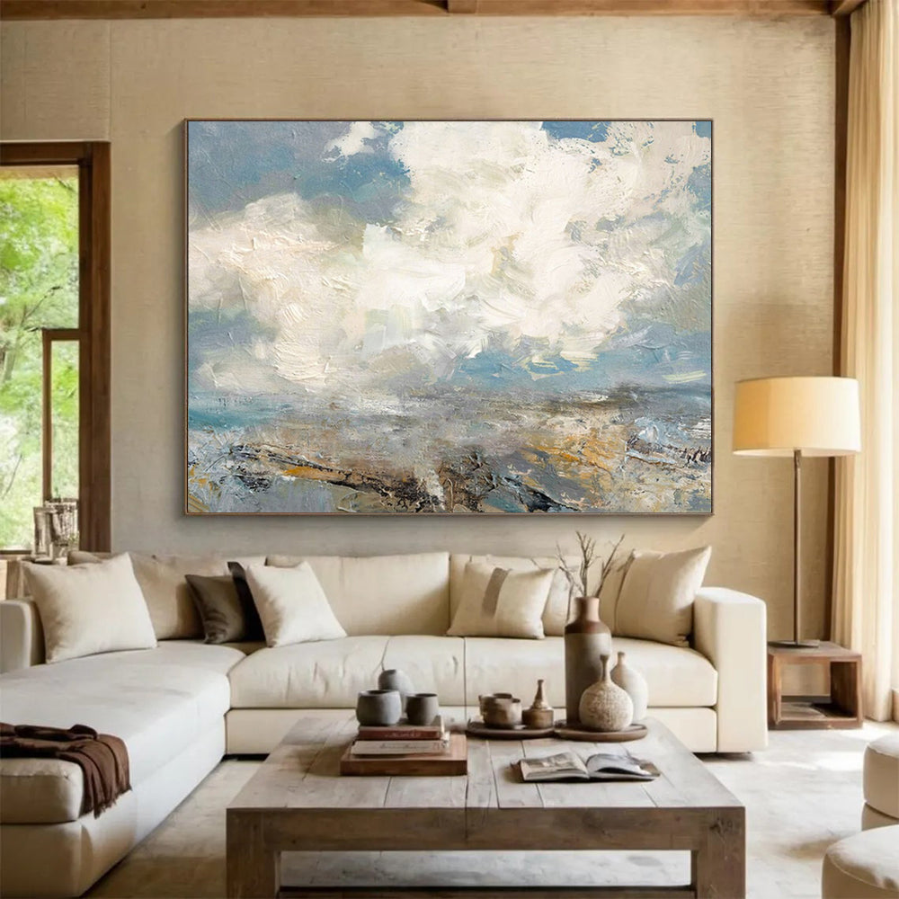 Seascape with fluffy clouds, blue sky, and a textured shoreline CT1665