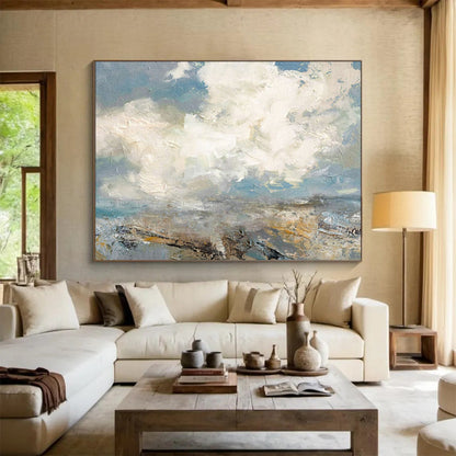 Seascape with fluffy clouds, blue sky, and a textured shoreline CT1665